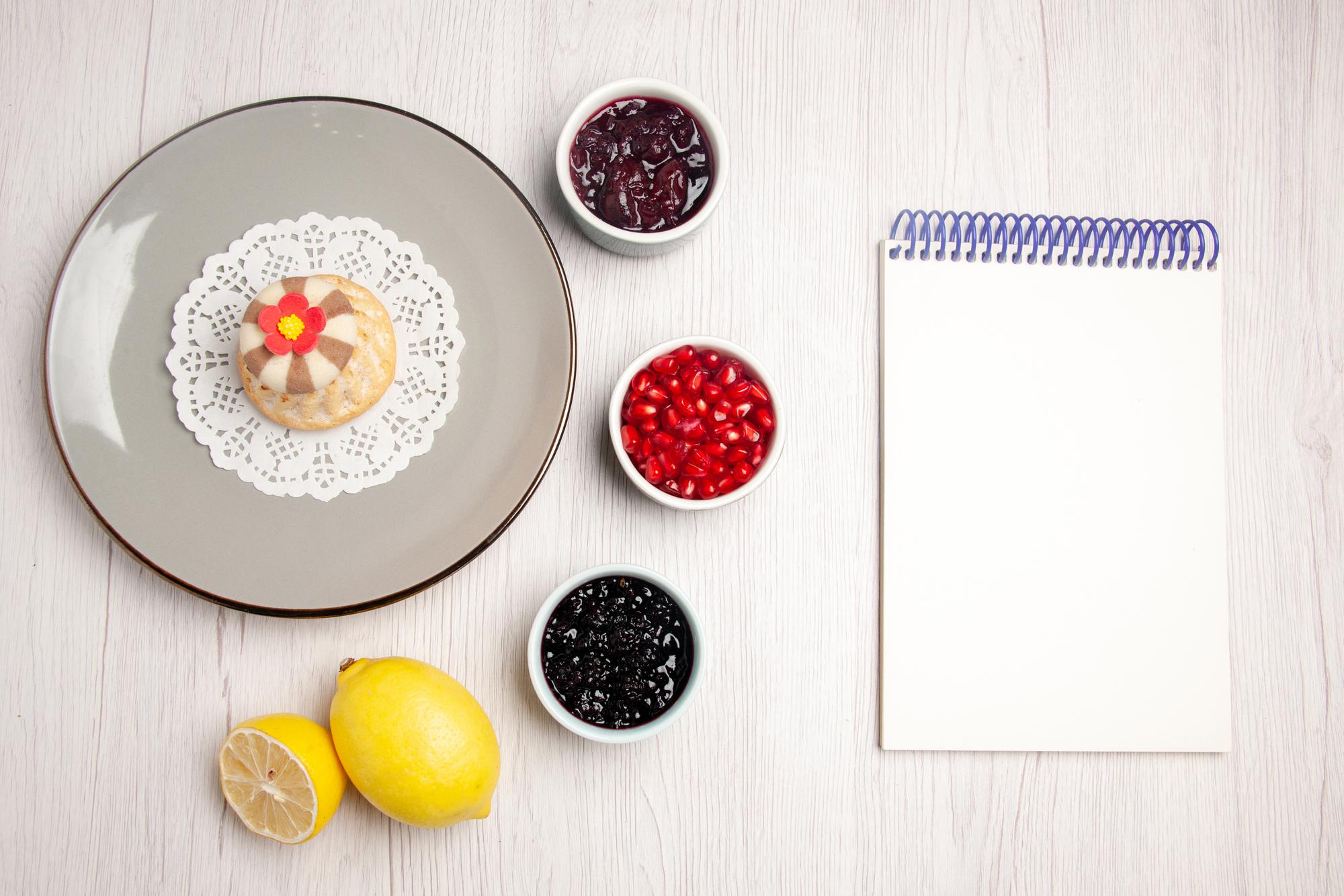 Flat lay of tasting menu notes and sample plates